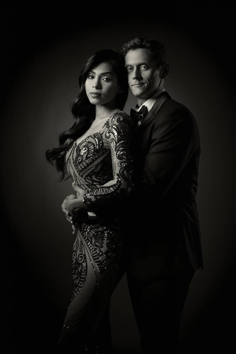 Couple embracing in a black-and-white portrait