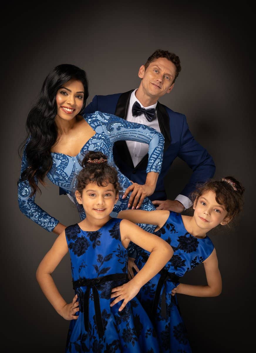 Family in matching blue outfits