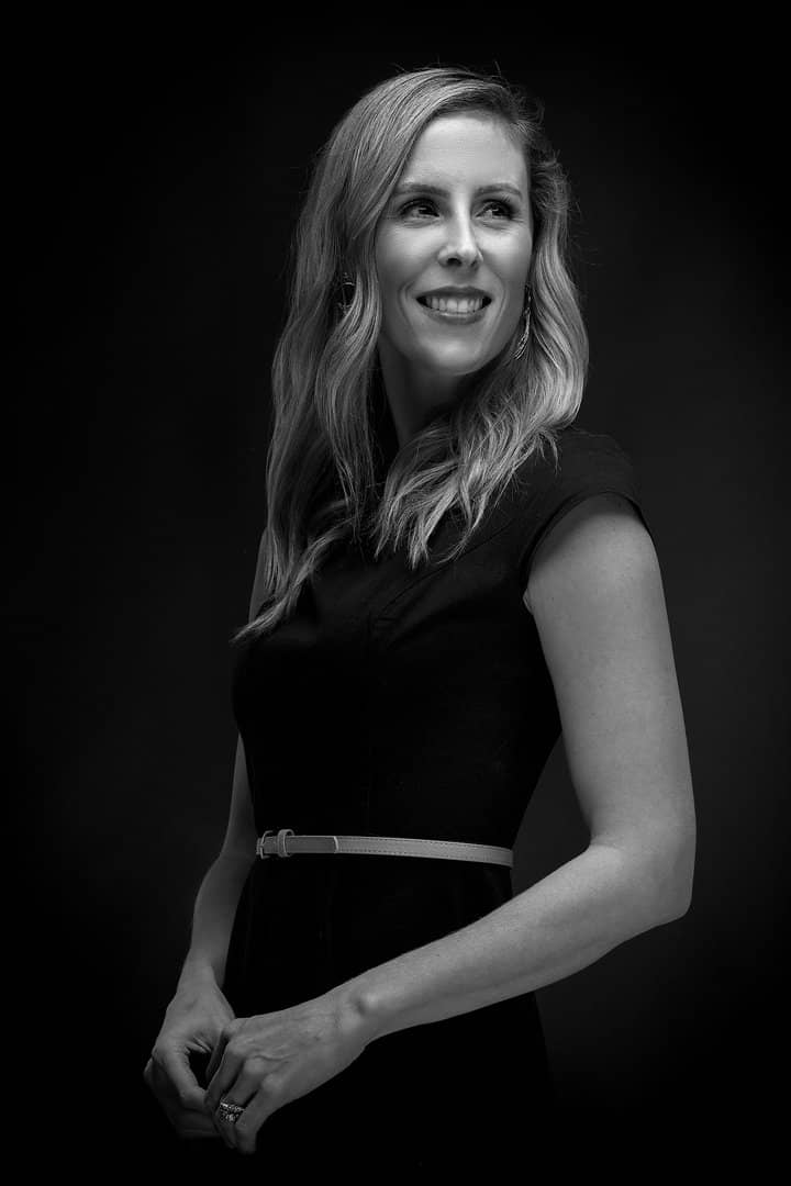Monochrome portrait of a woman in a black dress