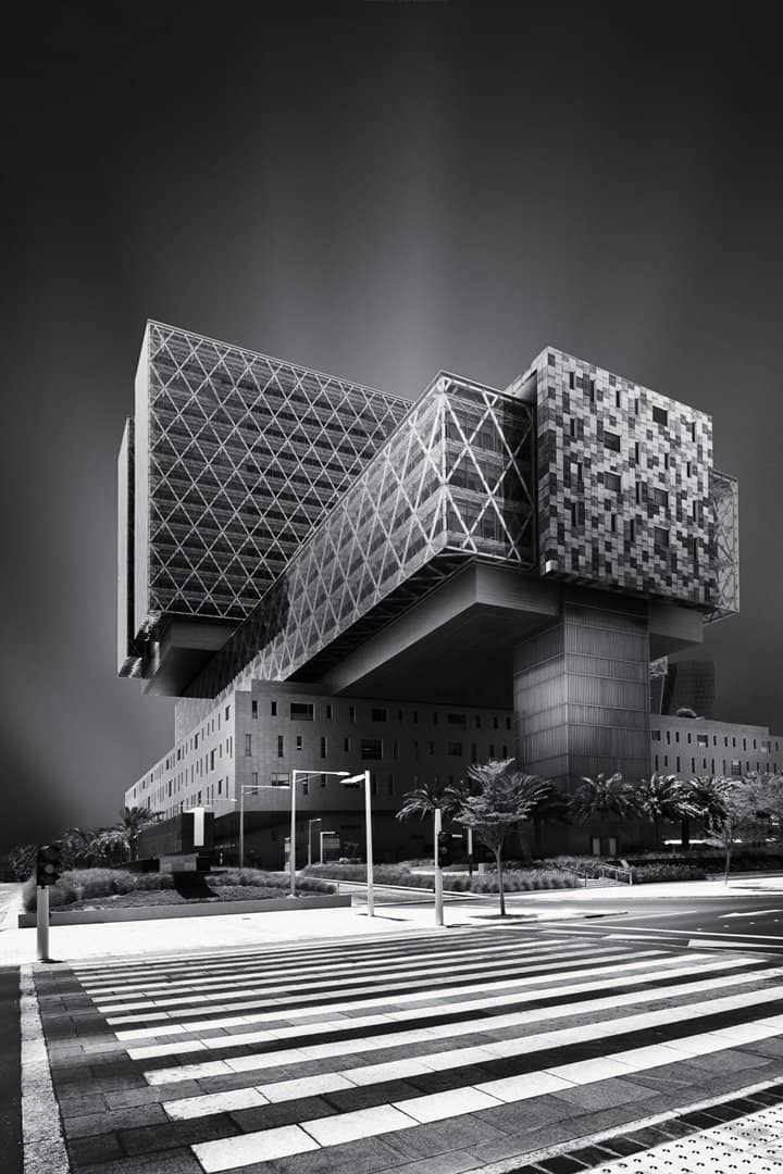 Monochrome building with a sculptural facade