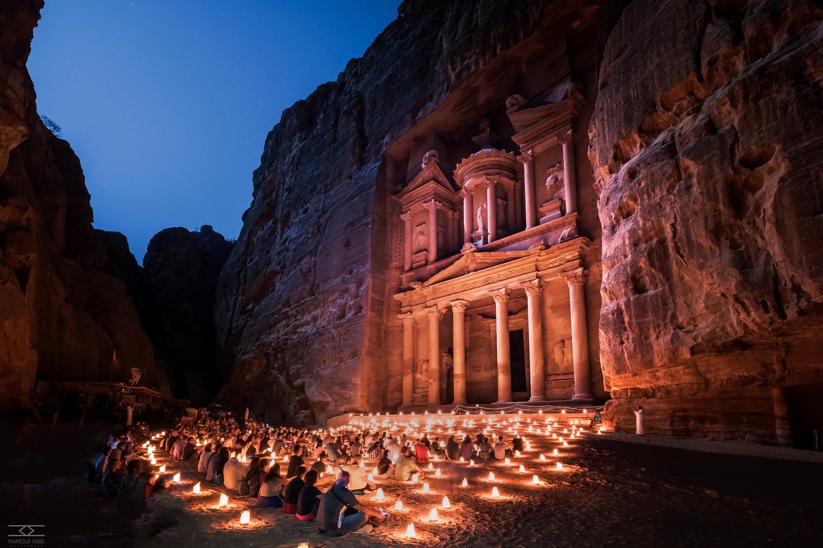 Petra's Treasury lit by candles at night